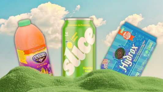 A bottle of Odwalla, a can of Slice, and a sleeve of Hydrox above rolling green grass.