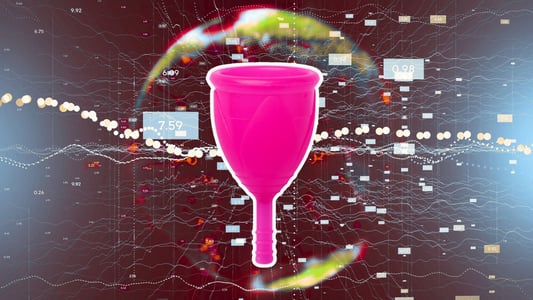 A pink menstrual cup. 