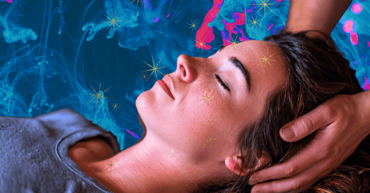 A woman getting a head massage.