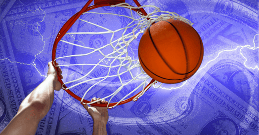 Hands dunking a basketball through a hoop on a purple background covered in dollar bills.