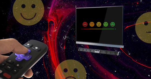 A hand pointing a remote control at a TV displaying a range of illustrated faces from happy to sad.